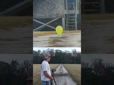 Long range with a slingshot 🎈 then skipping using a red Ryder #trickshot #sling shot #sports #skill