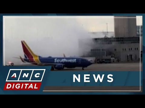 12 people rushed to hospital after plane catches fire in Denver | ANC