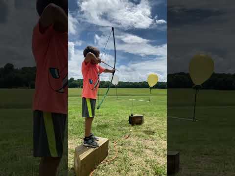 Kid does amazing archery trickshots #awesome #skill #archery #sports