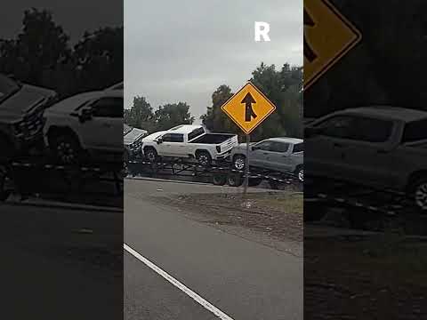 Trailer Full of Pickup Trucks Rolled Over!