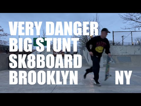 A nyc artist rides a skateboard in Brooklyn.