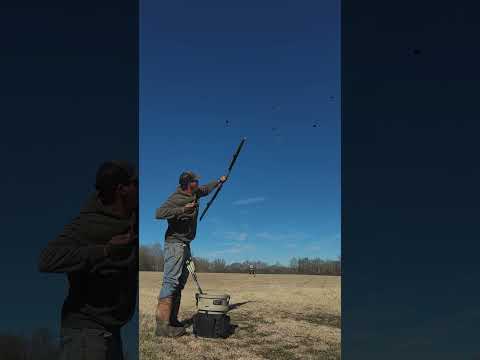 Breaking clays using a bow 🏹🎯 #outdoors #clay #trickshot #skill