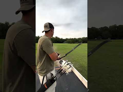 Archery trickshots while moving #trickshots #archery #truck #skills