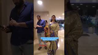 Anchor shyamala in blue saree spotted with cute smile along with her husband