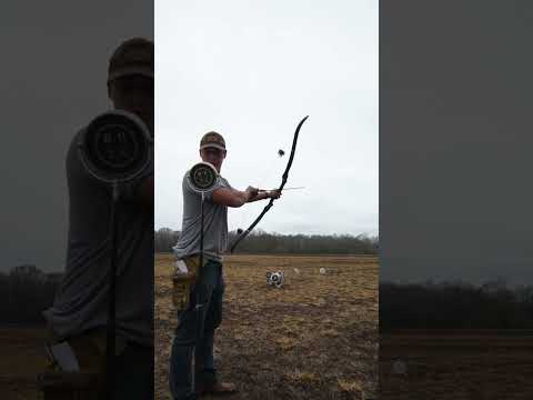 Close call with archery trickshots #archery #sports #skills #trickshots #awesome